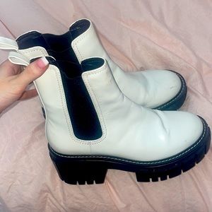 White and black combat boots